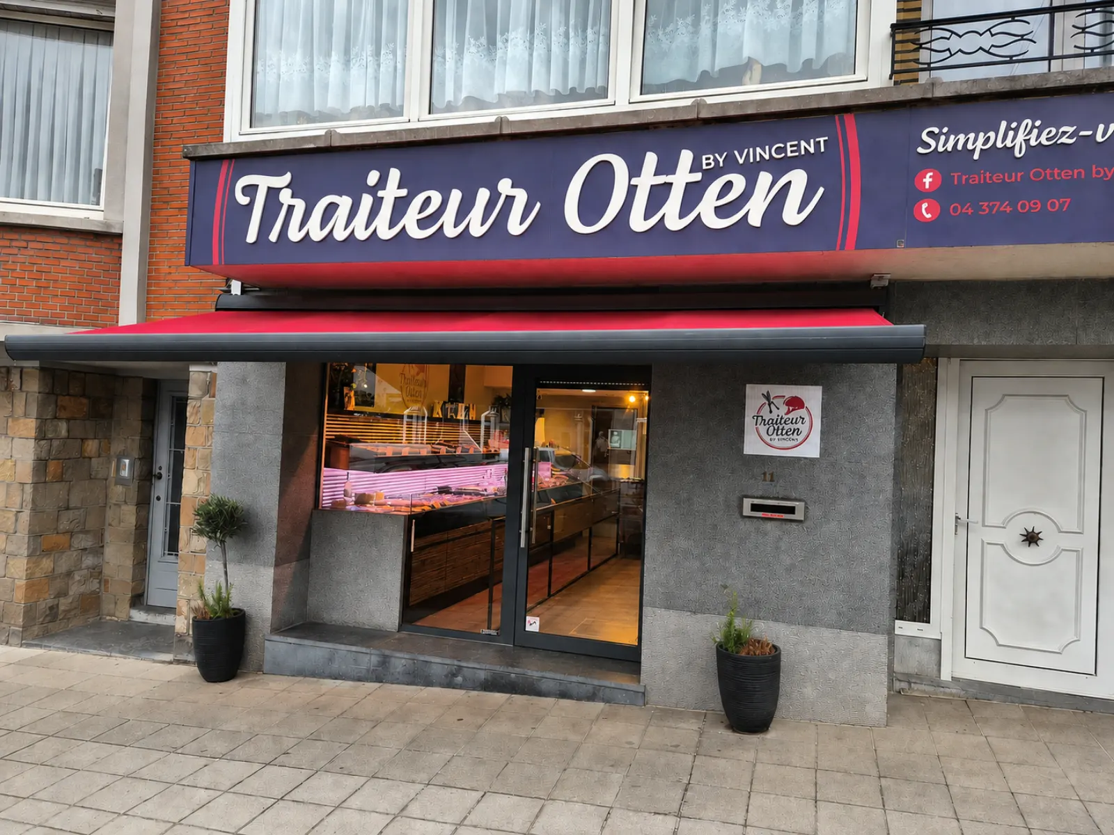 Façade du magasin Traiteur Otten by Vincent, store rouge et enseigne, avenue Albert 1er à Visé